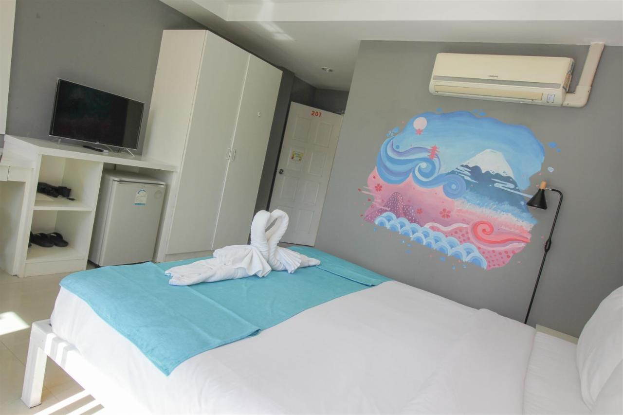 Guan Chao Yin Hotel Patong Buitenkant foto